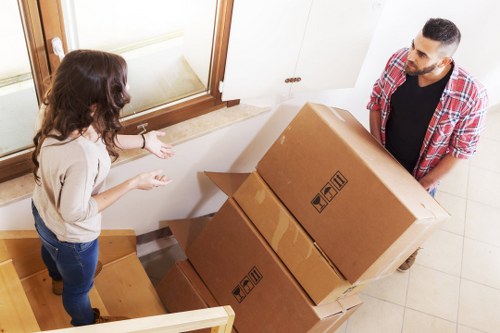Business relocation crew managing technology and furniture for office removals in Hackney