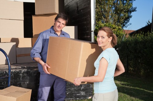 Unpacking and arranging belongings in a new Hackney flat